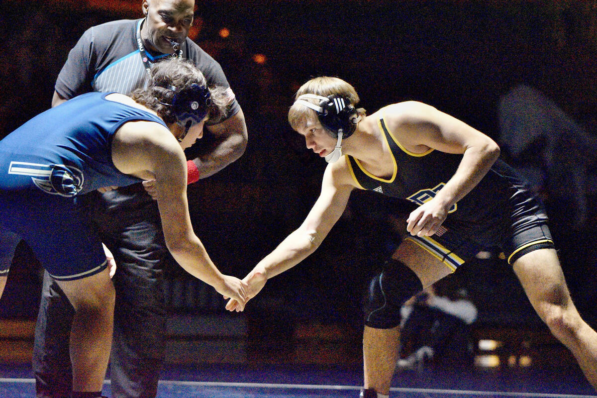 Robert Vendettoli/Boulder City Review Senior Boulder City wrestler Charlie Stewart, right, face ...