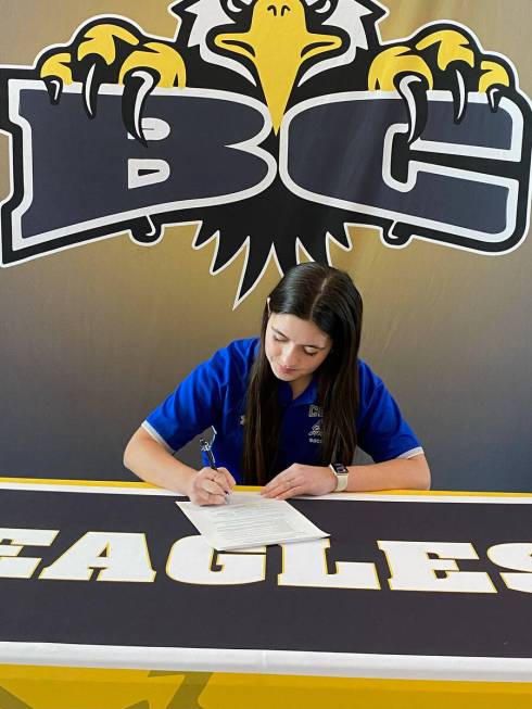 Photo by Arnold Orlando Sr. Natasha Orlando signs contract with University of Southern Nevada