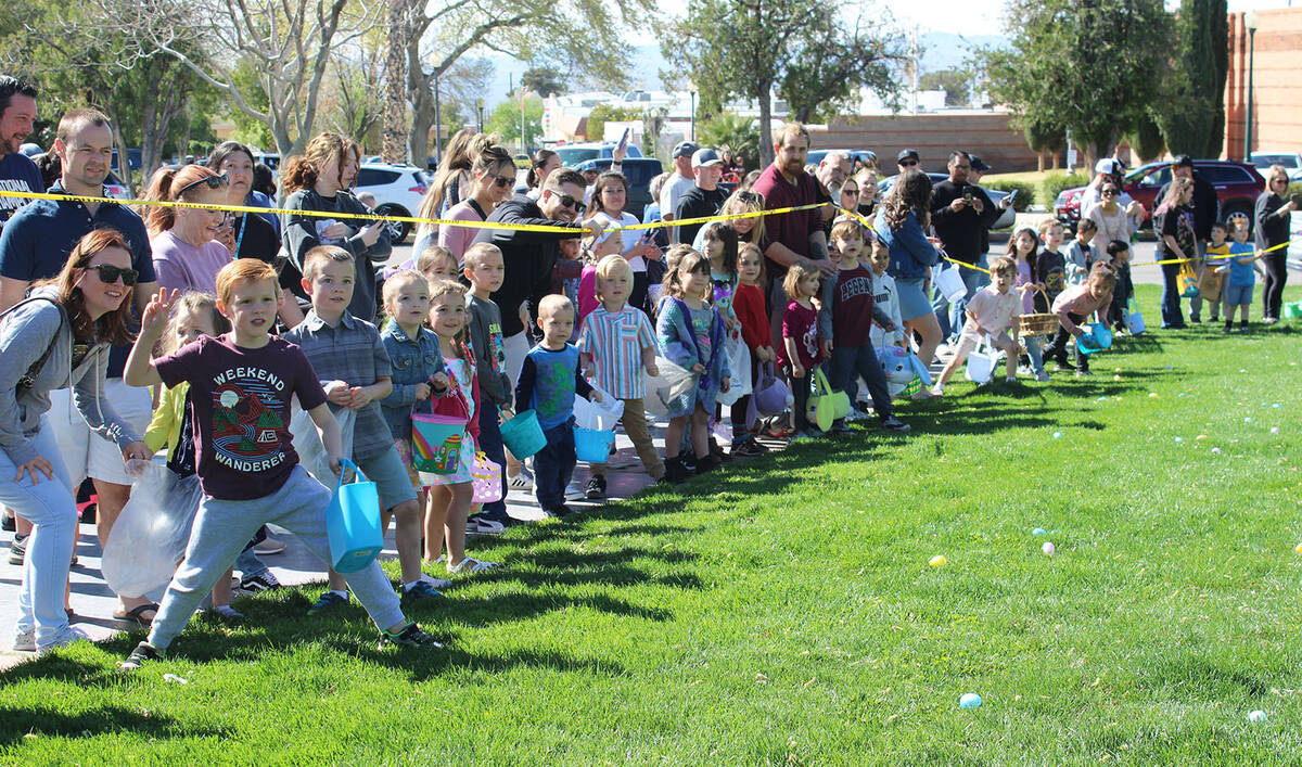 Kids aged 4 to 7 counted down with emcee Mike Pacini as they prepared to grab the thousands of ...