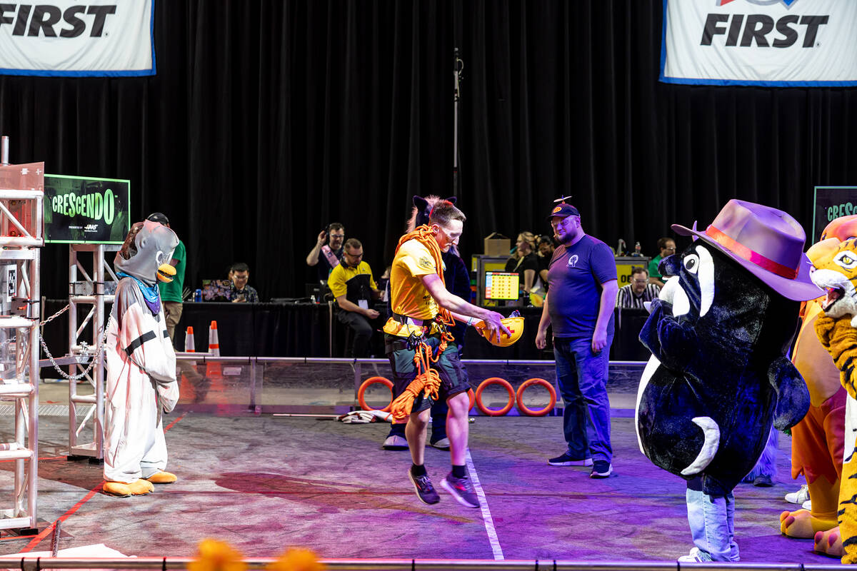 Photo courtesy of Yenor Photos Team member Brandon Pickett competing in a mascot dance-off tha ...