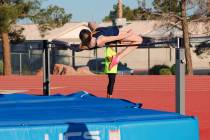 Photo courtesy Mark Misuraca Leaping for first, senior Aspen Christian soars in the High Jump a ...