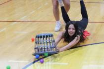Sophomore Delaney Loeslein gets some assistance during the class challenge of Hungry, Hungry Hippo.
