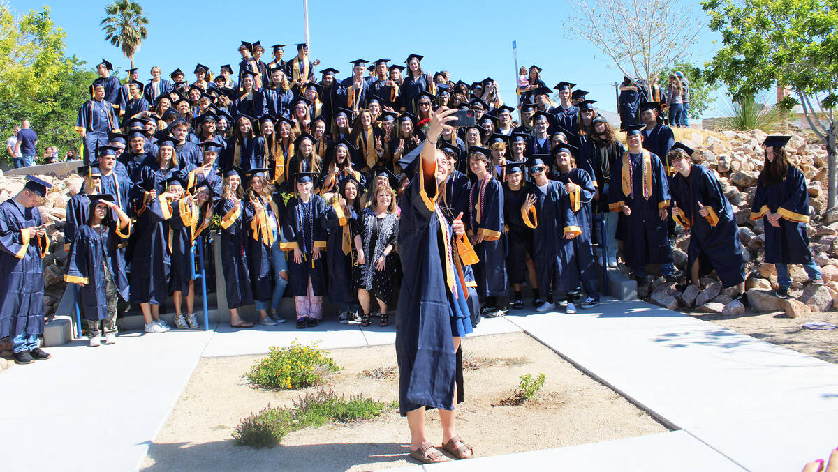 Senior and student body historian Megan Uszynski takes a selfie with her classmates following F ...