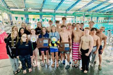 Photo courtesy Yolanda Martinez Boulder City High School boys and girls swim programs pose ...