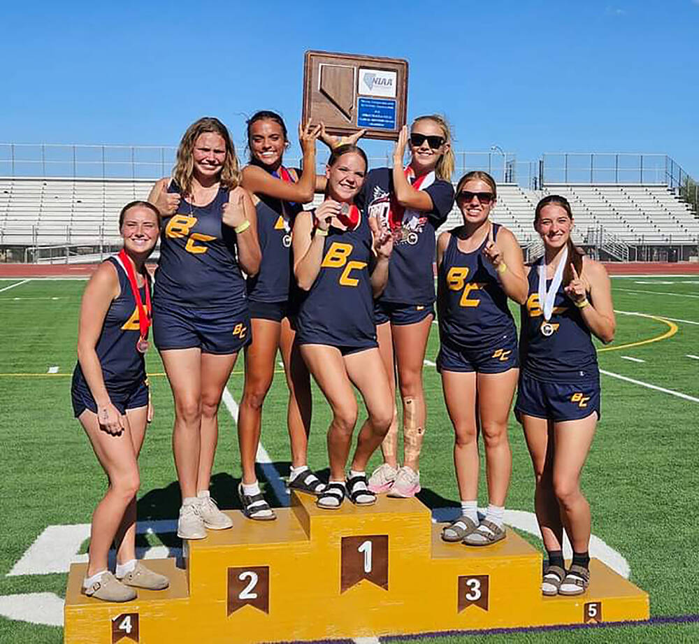 Photo courtesy Boulder City High School Members of the BCHS girls track team pose with their re ...