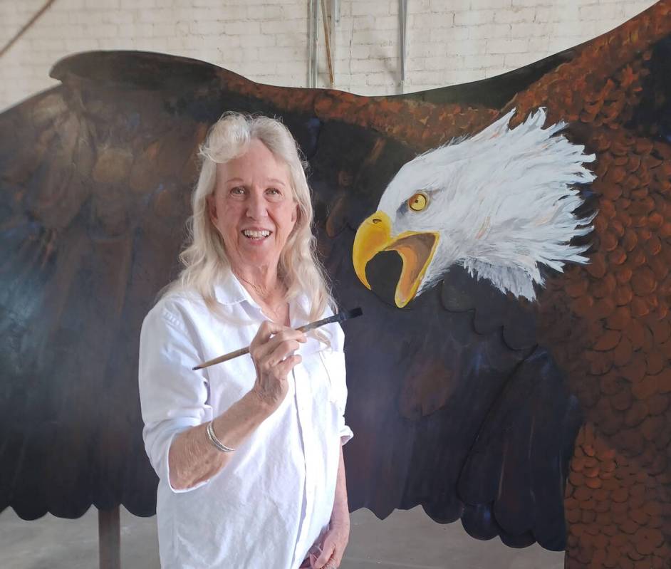 Photo courtesy Linda Barnett Lynne Jordan, during her painting of the eagle, which now sits out ...