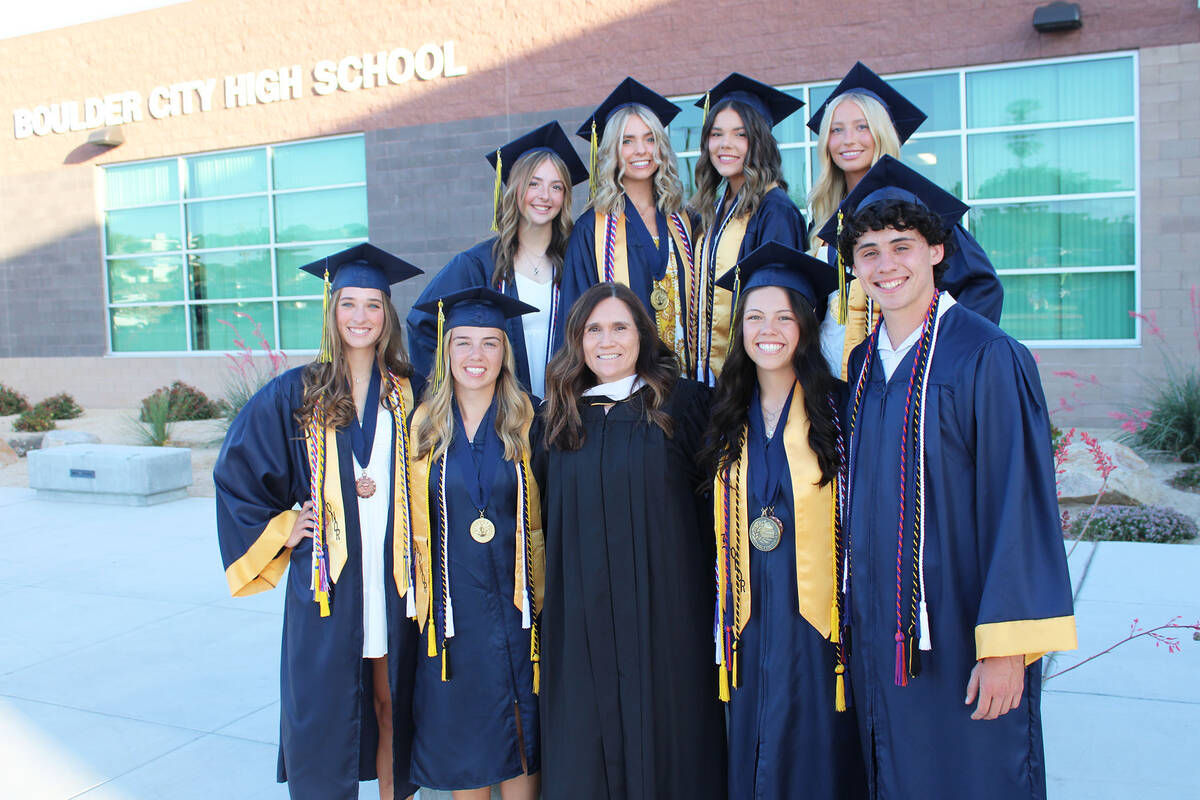 Cheryl Herr, center, poses with the senior members of her Student Council class.