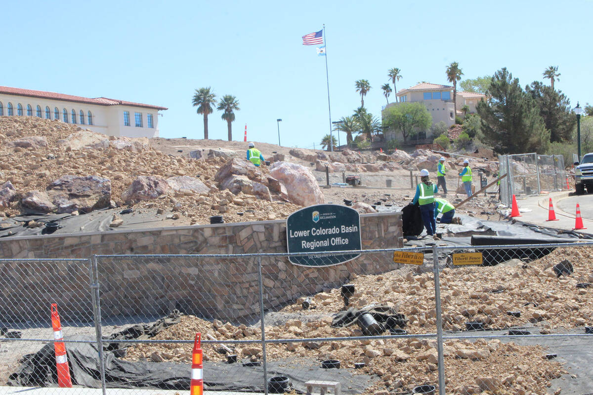 Ron Eland/Boulder City Review Crews continue to work on the xeriscape project at the Bureau of ...