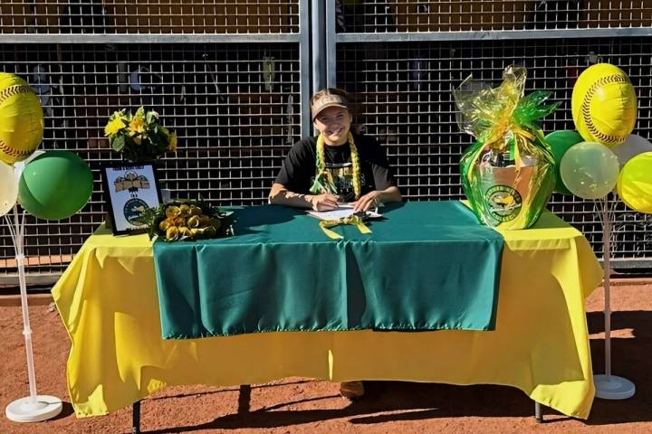 Photo courtesy Joianne Madrid Putting pen to paper, Boulder City senior Talynn Madrid signs wit ...