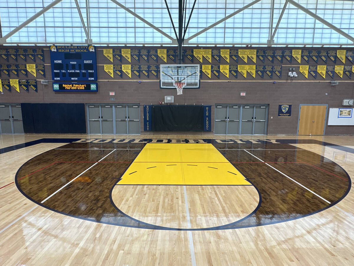 Photos courtesy Boulder City High School Crews were busy this summer replacing the flooring at ...