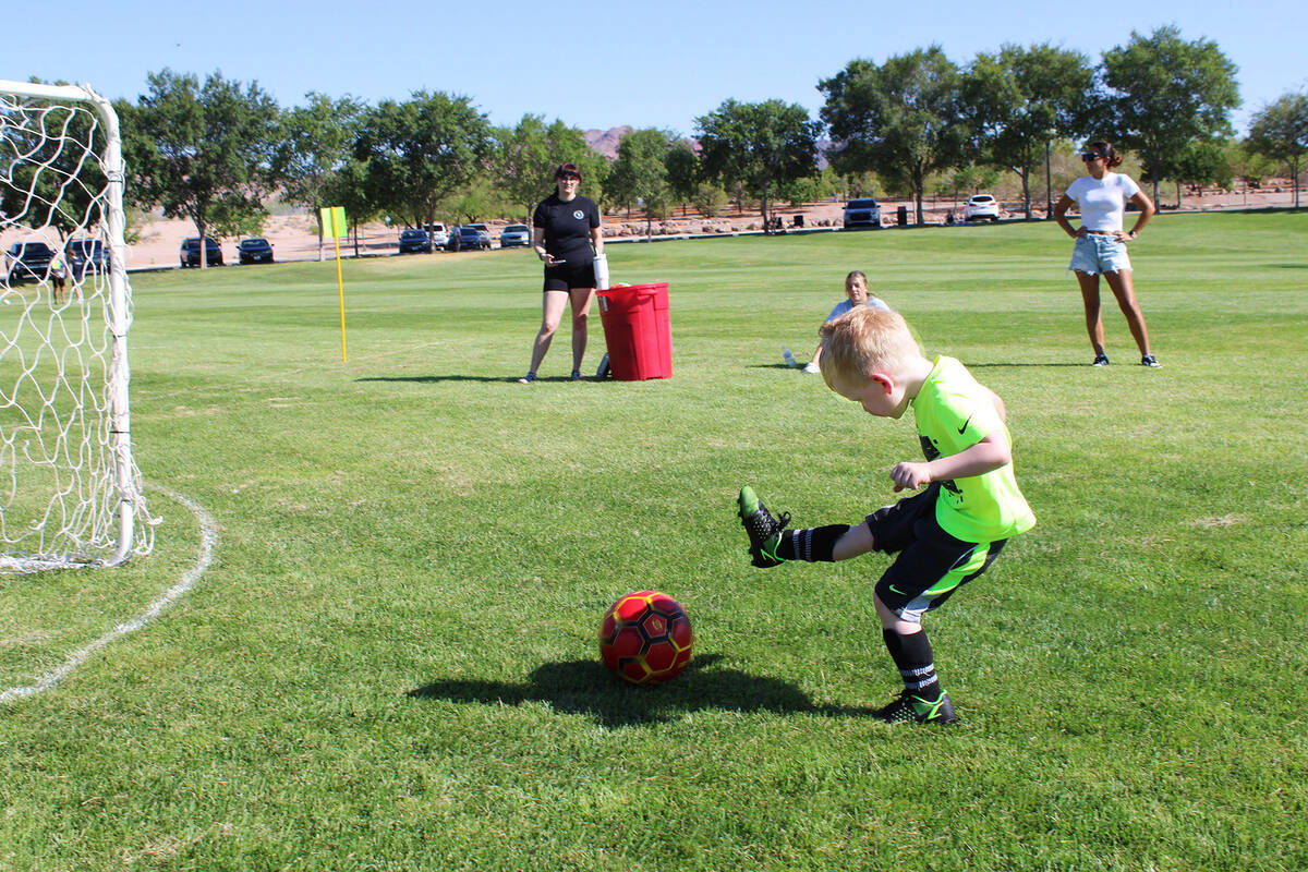 Photos by Ron Eland Dozens of kids came out Saturday from grades K-8, at the Veterans' Memorial ...