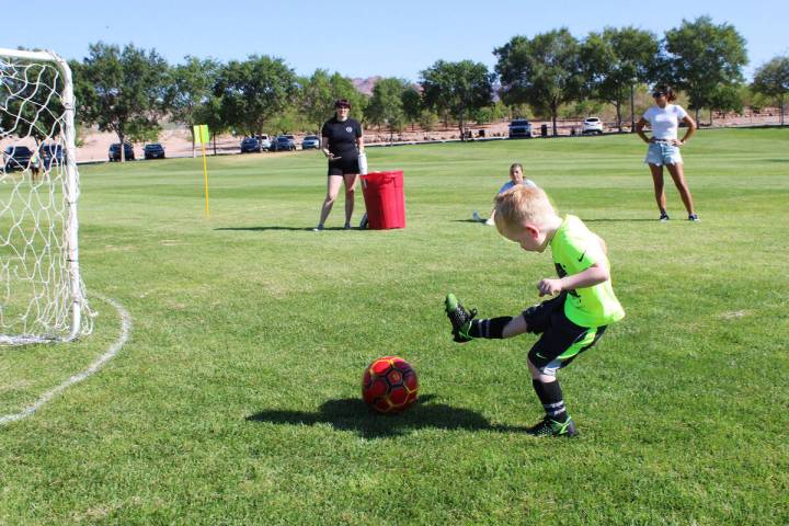 Photos by Ron Eland Dozens of kids came out Saturday from grades K-8, at the Veterans' Memorial ...