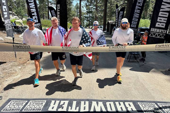 Photo courtesy Tyler Nash As Tyler Nash crossed the finish line, he was joined by members of hi ...