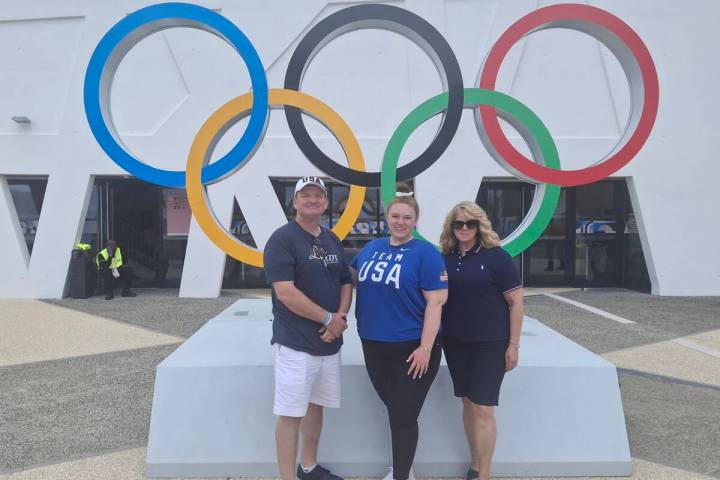 Photo courtesy Jill Lagan Barry and Jill Lagan join their daughter, Lexi, outside the Olympic V ...