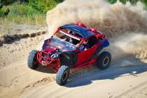 Courtesy Getty Images ATV and UTV off-road vehicle racing in sand dunes.