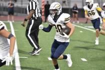 Robert Vendettoli/Boulder City Review Returning an interception the other way, junior Aiden Arm ...