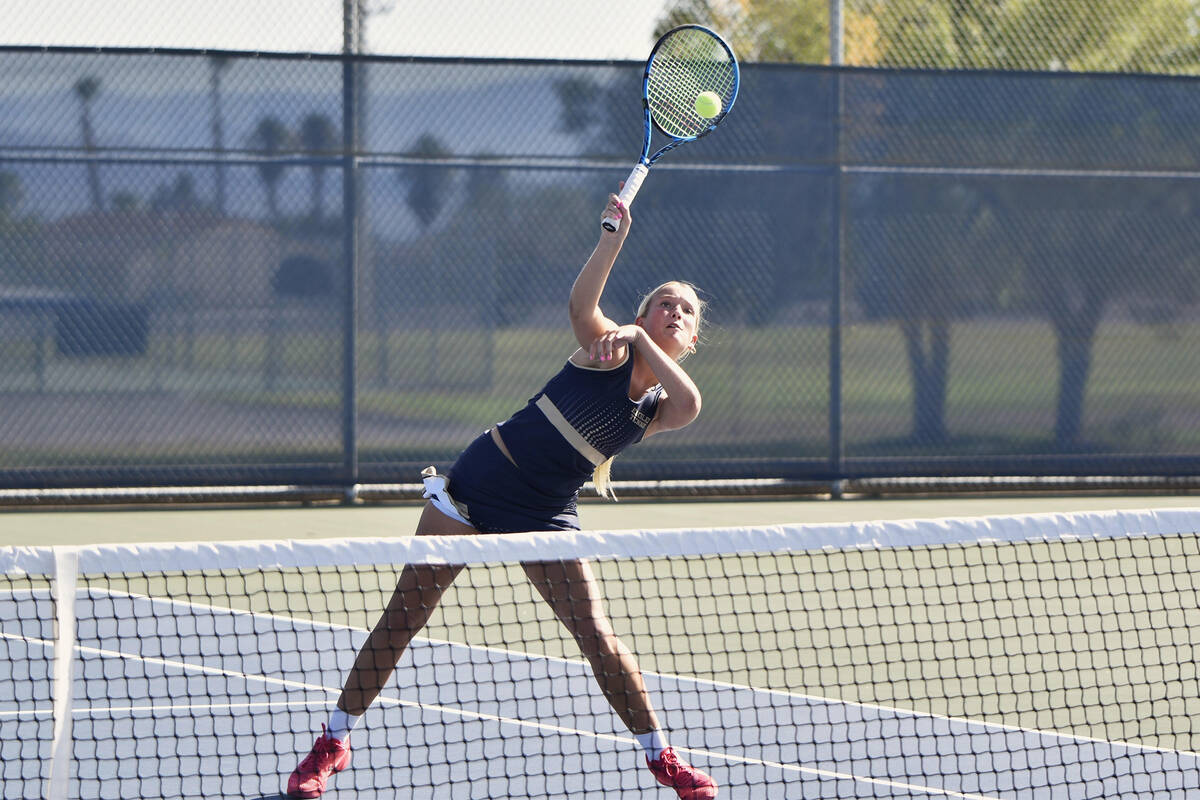 Robert Vendettoli/Boulder City Review Fully extending, senior Maddie Morris returns the ball ag ...