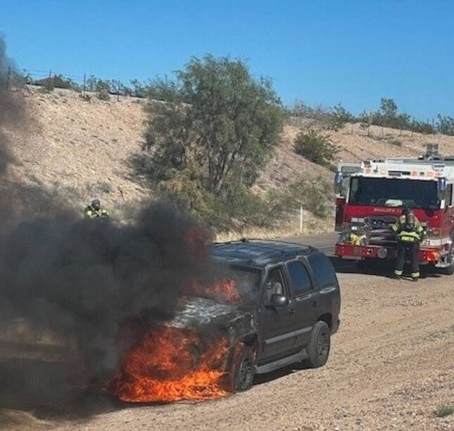 Courtesy of Boulder City Fire Department Firefighters respond to a vehicle fire.