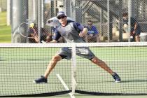 Robert Vendettoli/Boulder City Review Returning the ball back into play, Sophomore Tate Crine e ...