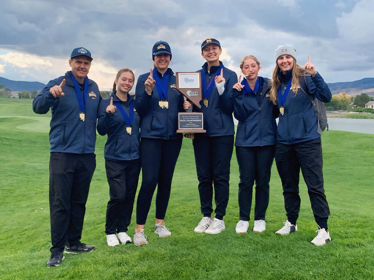 Photo courtesy Robert Reese Boulder City High School girls golf celebrate their 3A state champi ...