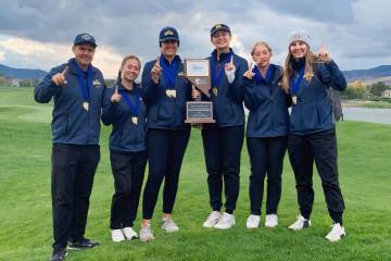 Photo courtesy Robert Reese Boulder City High School girls golf celebrate their 3A state champi ...