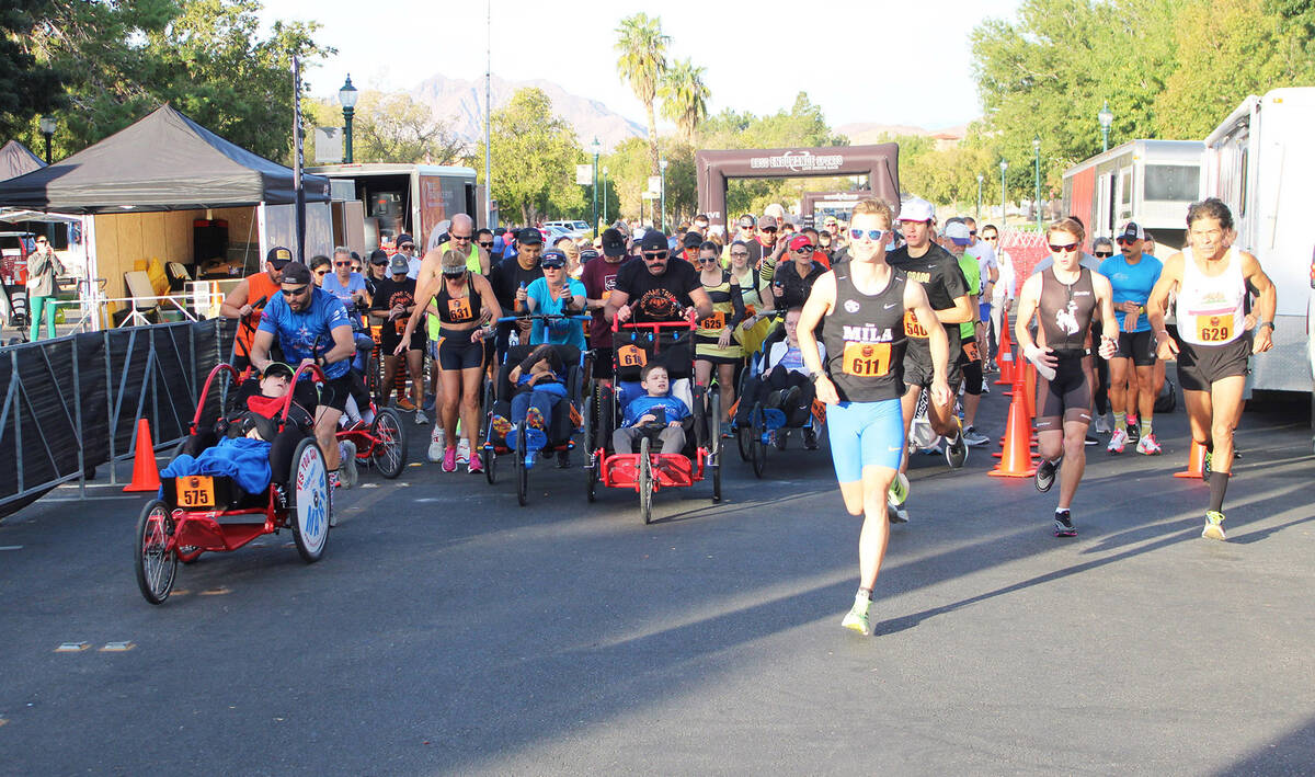 The Pumpkinman Triathlon, which started at Lake Mead and finished in town, also featured a 5k a ...