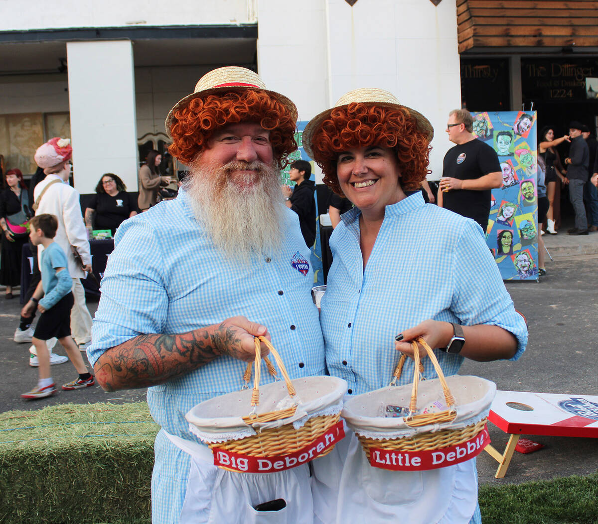 Brock and Merissa Fletcher were two of many who dressed up for the block party on Arizona Stree ...