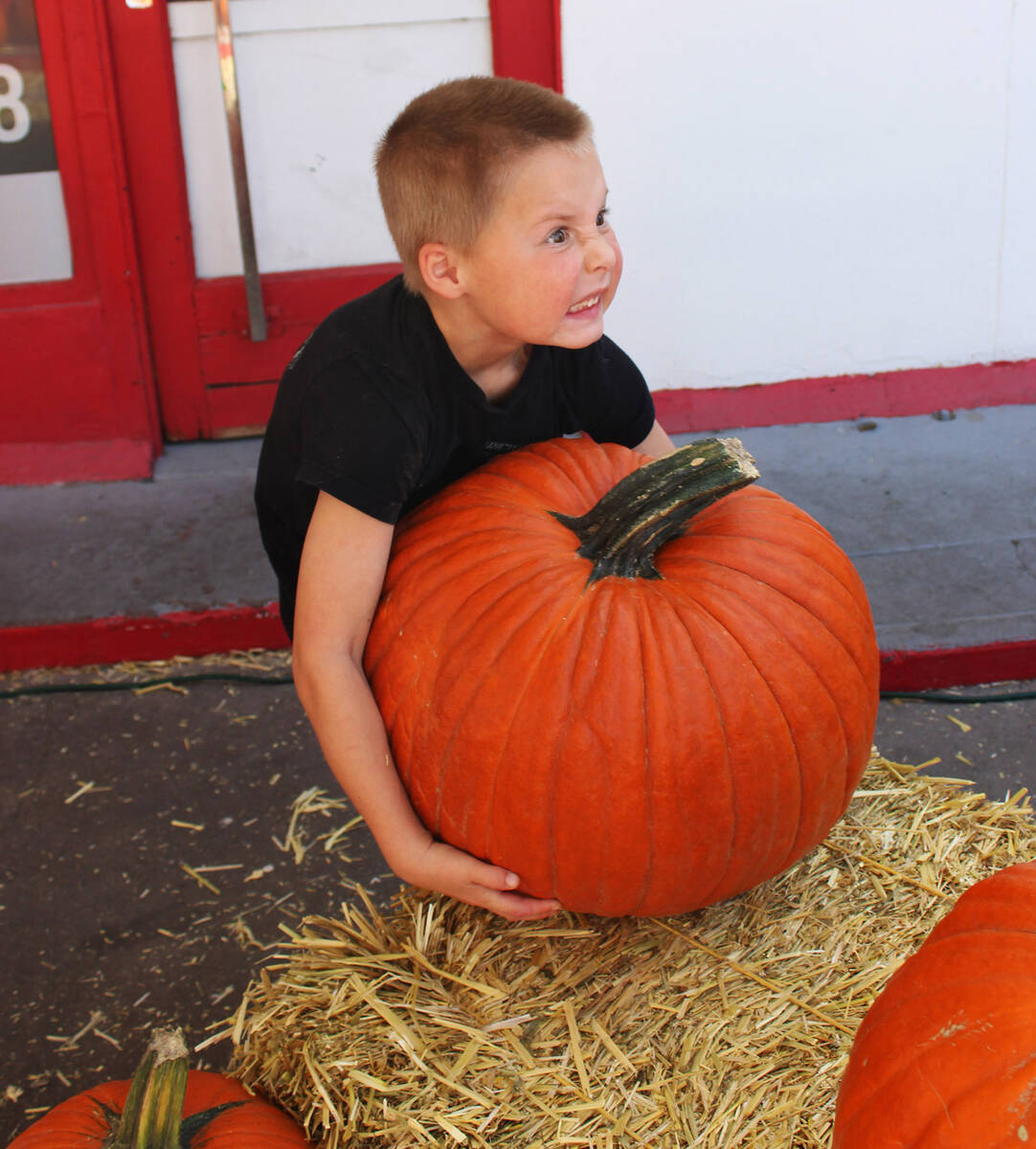 Ron Eland/Boulder City Review Six-year-old Karter Dunbar tried his best to lift this large pump ...