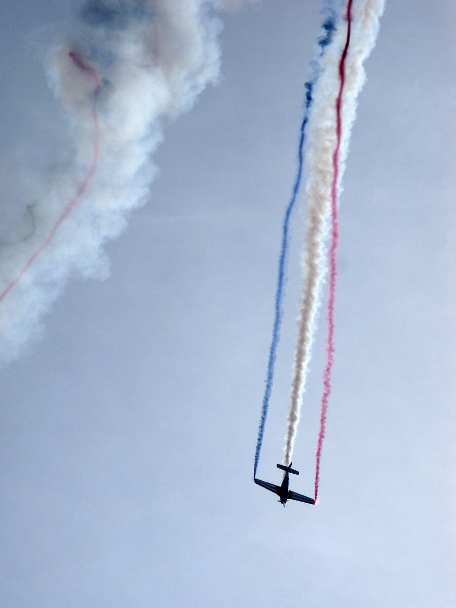 Flyer trails red, white and blue smoke in the 2009 event.