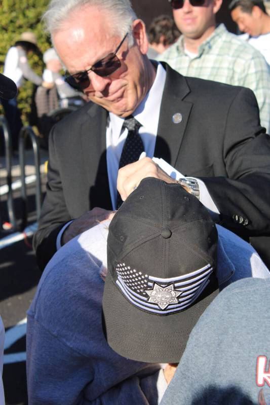 Ron Eland/Boulder City Review Nevada Gov. Joe Lombardo signs the sweatshirt of Boulder City res ...