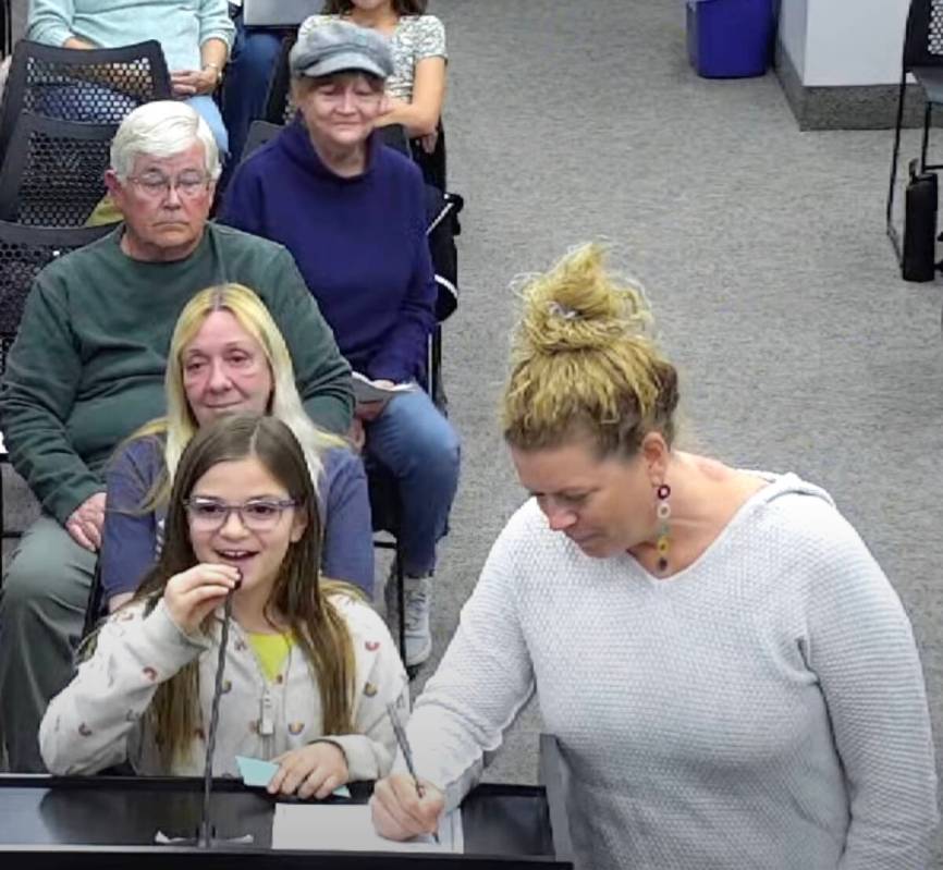 (Screenshot) 11-year-old Lily Runco, a member of the Rainbow Readers group that reads to animal ...