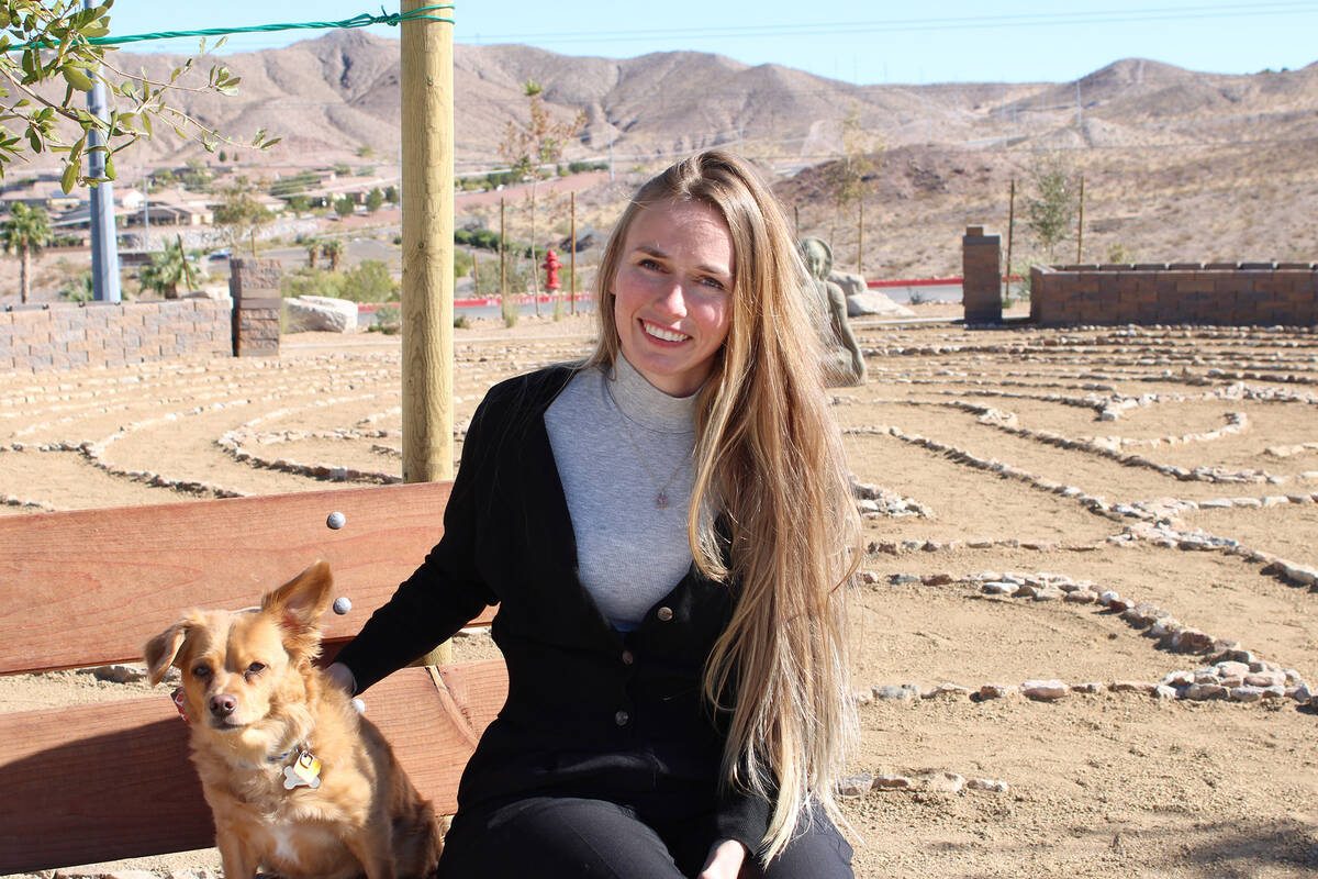 Ron Eland/Boulder City Review Annika Huff, and her dog Orly, sit outside of the soon-to-be-open ...