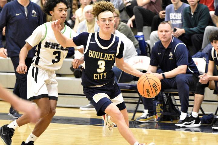 Robert Vendettoli/Boulder City Review file photo Senior Sean Pendleton drives past his defender ...