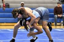 Robert Vendettoli/Boulder City Review Jackson Buettner wrestles his opponent to the ground agai ...