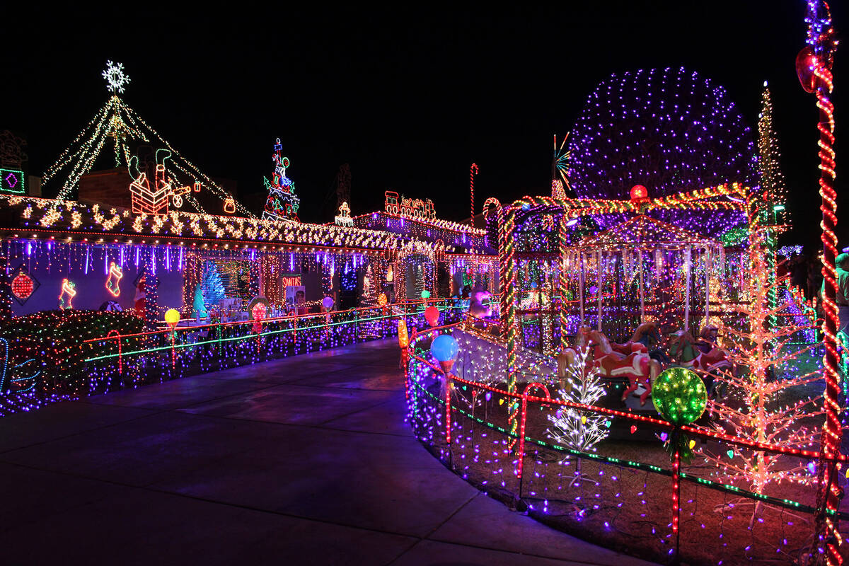 The lighting of the Christmas House on Fifth Street has become a tradition for many families ov ...