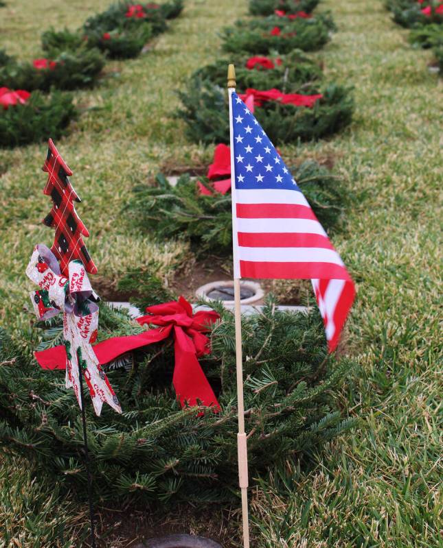 An American flag was placed at one of the gravesites along with a wreath.