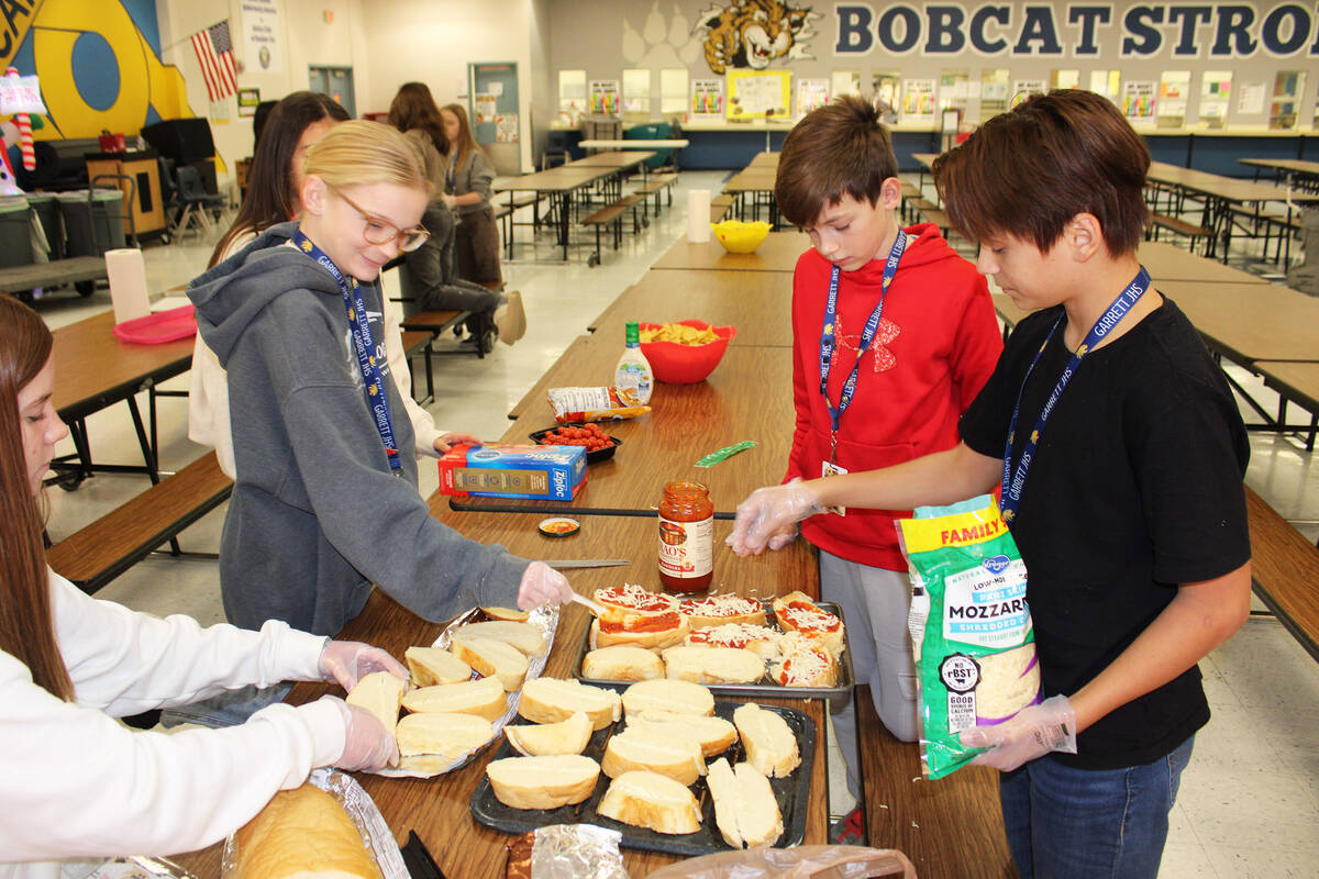 Students helped prepare a meal last week using many of the vegetables and herbs harvested.