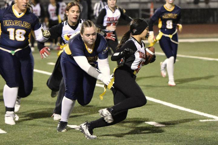 Photos by Robert Vendettoli Peyton Rogers tracks down the ball carrier for a tackle against Dor ...