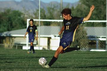 Photo courtesy Catherine Goode Sean Pendleton launches a shot against Moapa Valley on Oct. 8. P ...