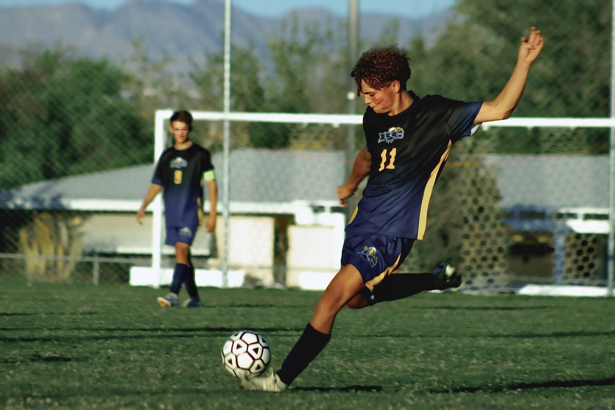 Photo courtesy Catherine Goode Sean Pendleton launches a shot against Moapa Valley on Oct. 8. P ...