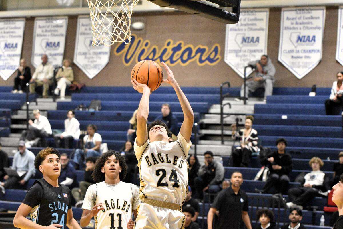 Robert Vendettoli/Boulder City Review Jayden Thackeray goes up for a shot against Sloan Canyon ...