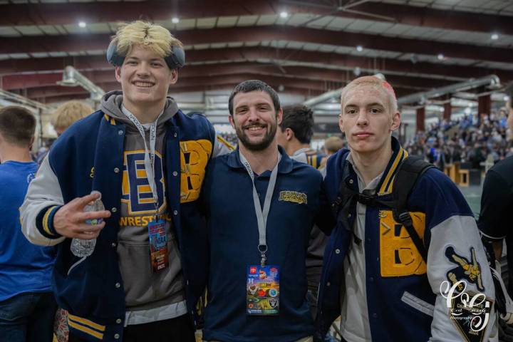 Photo courtesy Cat Goode Sam Bonar and Logan Goode celebrate with Coach Clinton Garvin at the 3 ...