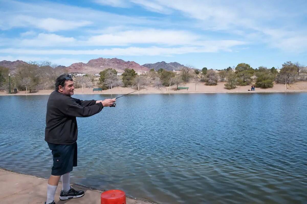 Ian Cruz/Boulder City Review Gregory Ressel casts a line for trout at the Boulder City Urban Pond.