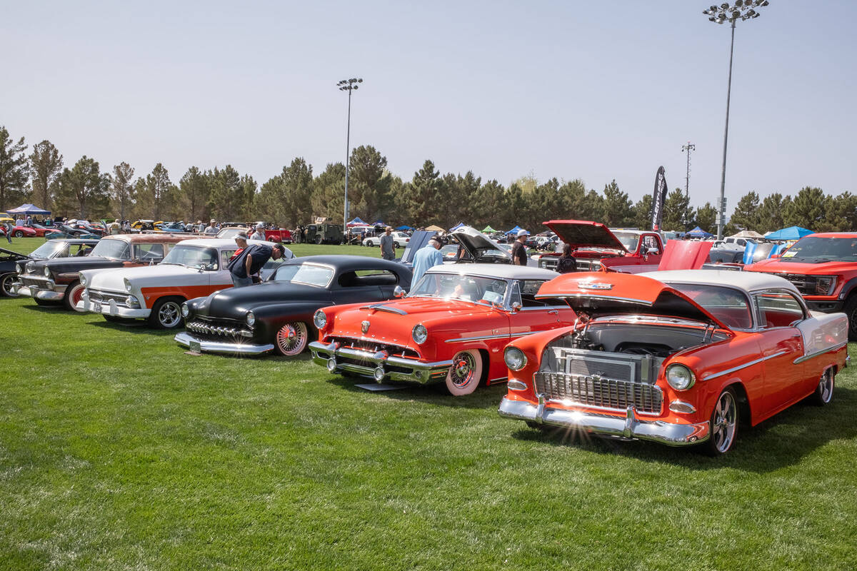 A lineup of classic American cars shine in the sun at the Injured Police Officer Fund Classic C ...