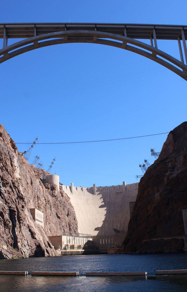 With the Mike O'Callaghan-Pat Tillman Bridge above, those on the raft trip are able to get a ve ...