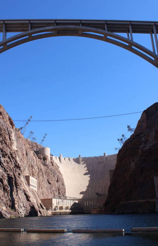 With the Mike O'Callaghan-Pat Tillman Bridge above, those on the raft trip are able to get a ve ...