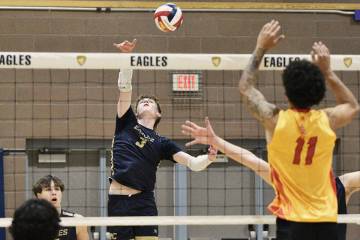 Robert Vendettoli/Boulder City Review David Zwahlen swats the ball into the opposing court agai ...