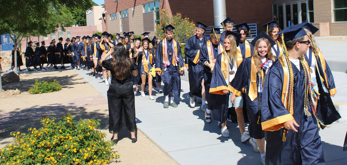 Ron Eland/Boulder City Review Once back at BCHS, the seniors walked the halls to the cheers of ...