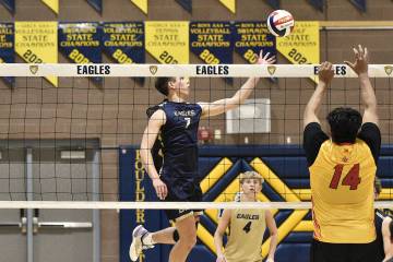 Robert Vendettoli/Boulder City Review Sam O'Shaughnessy lofts the ball past the Somerset Losee ...