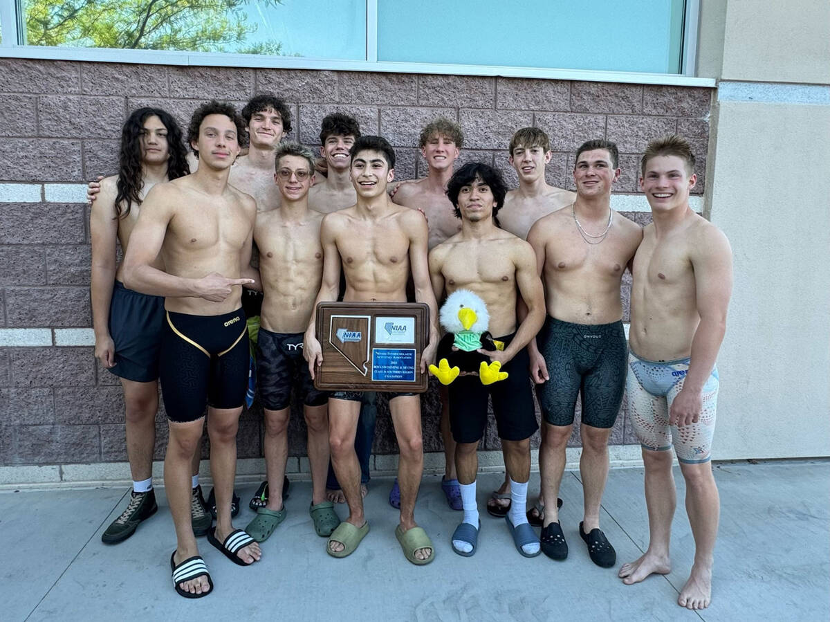 Photo courtesy Sara Carroll The boys swim team celebrate winning the 3A Southern Regional champ ...